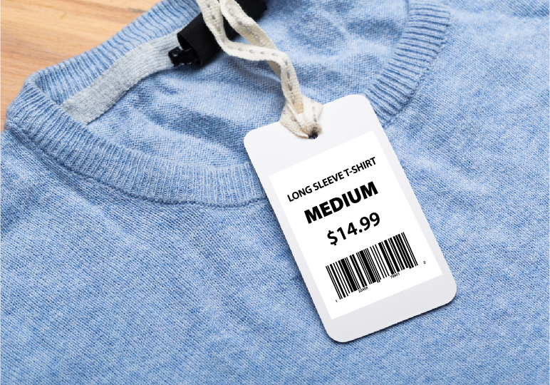 clothing tag on a blue sweater