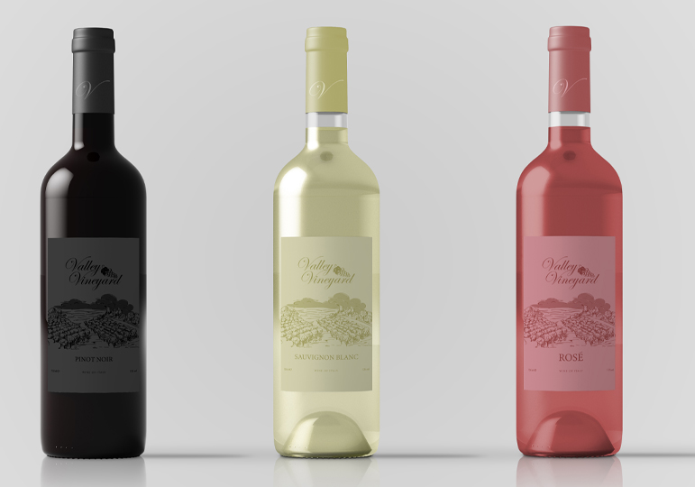 red white and rose wine bottles